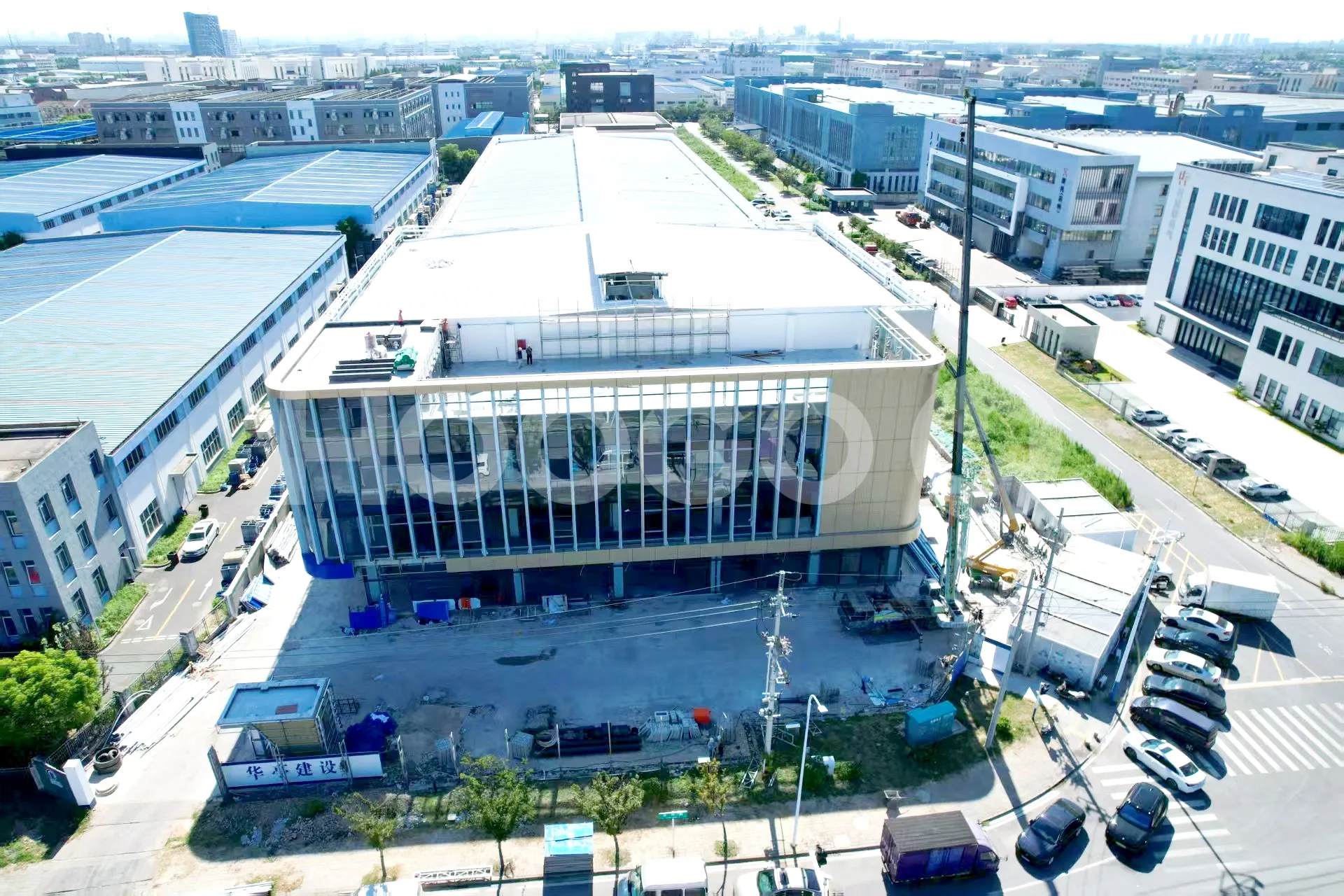 Aerial drone view of Hoogo main factory building and structural roof design