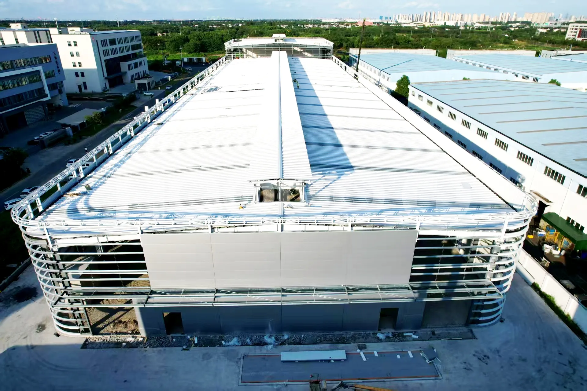 Aerial drone view of Hoogo main factory building and structural roof design